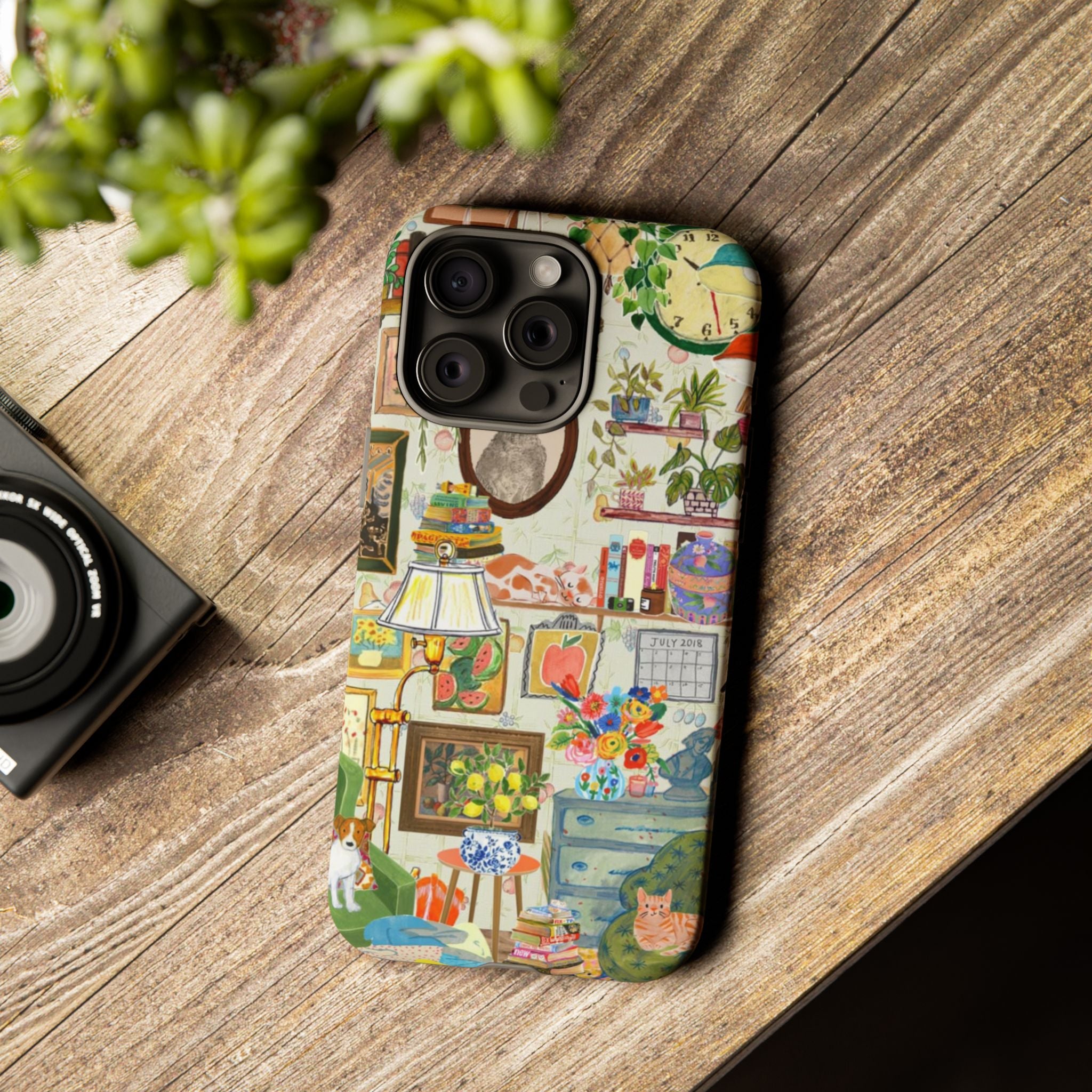 Cute cat portrait phone case for iPhone 17, stylish Printify pet-themed case with cozy living room design.