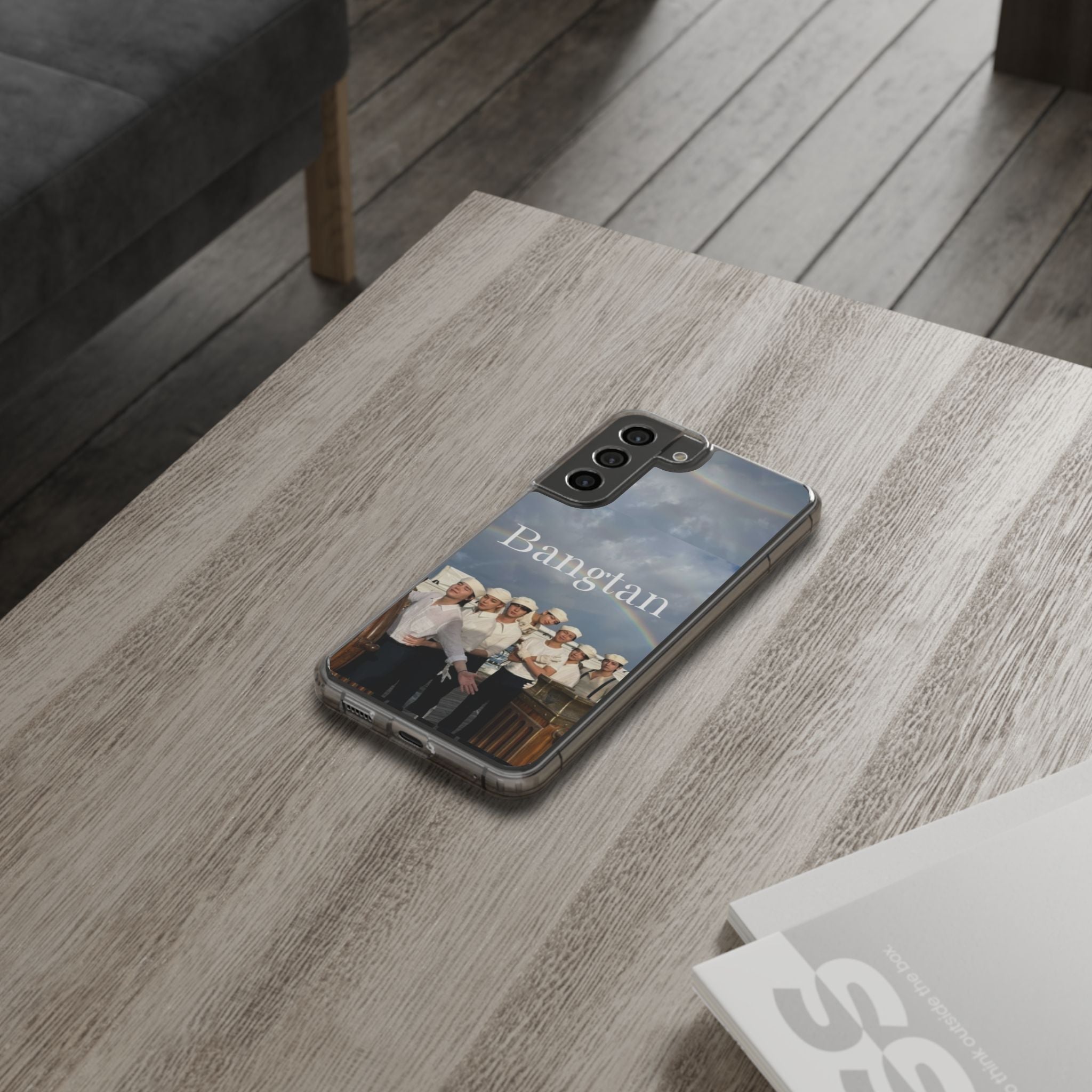 Clear impact-resistant phone case featuring cute Bangtan K-pop design, compatible with smartphones.
