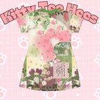Pink and green floral apple star print T-shirt dress by Printify featuring all-over floral and star designs for casual spring wear.