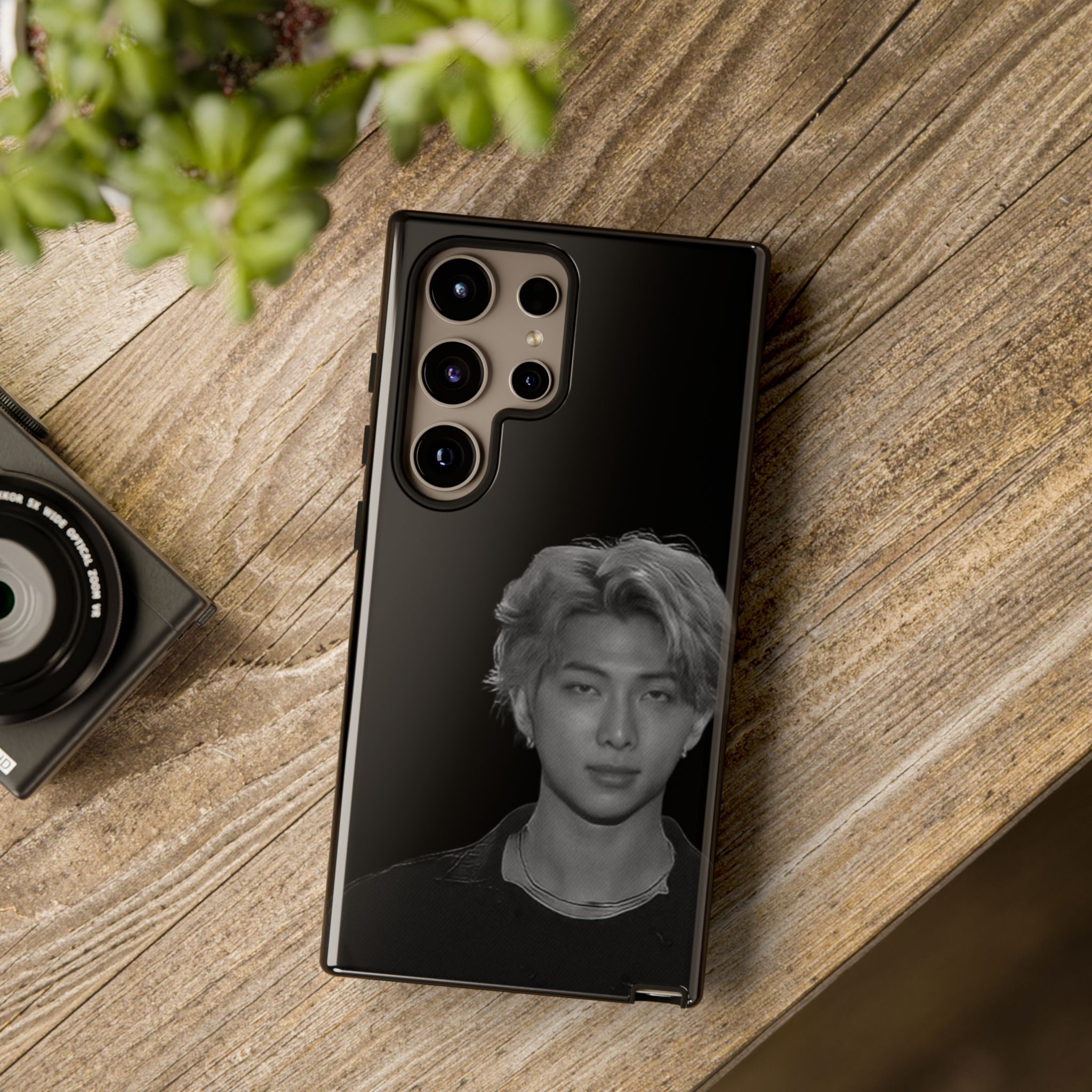 Namjoon BTS concert iPhone case by Printify, durable phone protector with custom design featuring BTS imagery and vibrant colors.