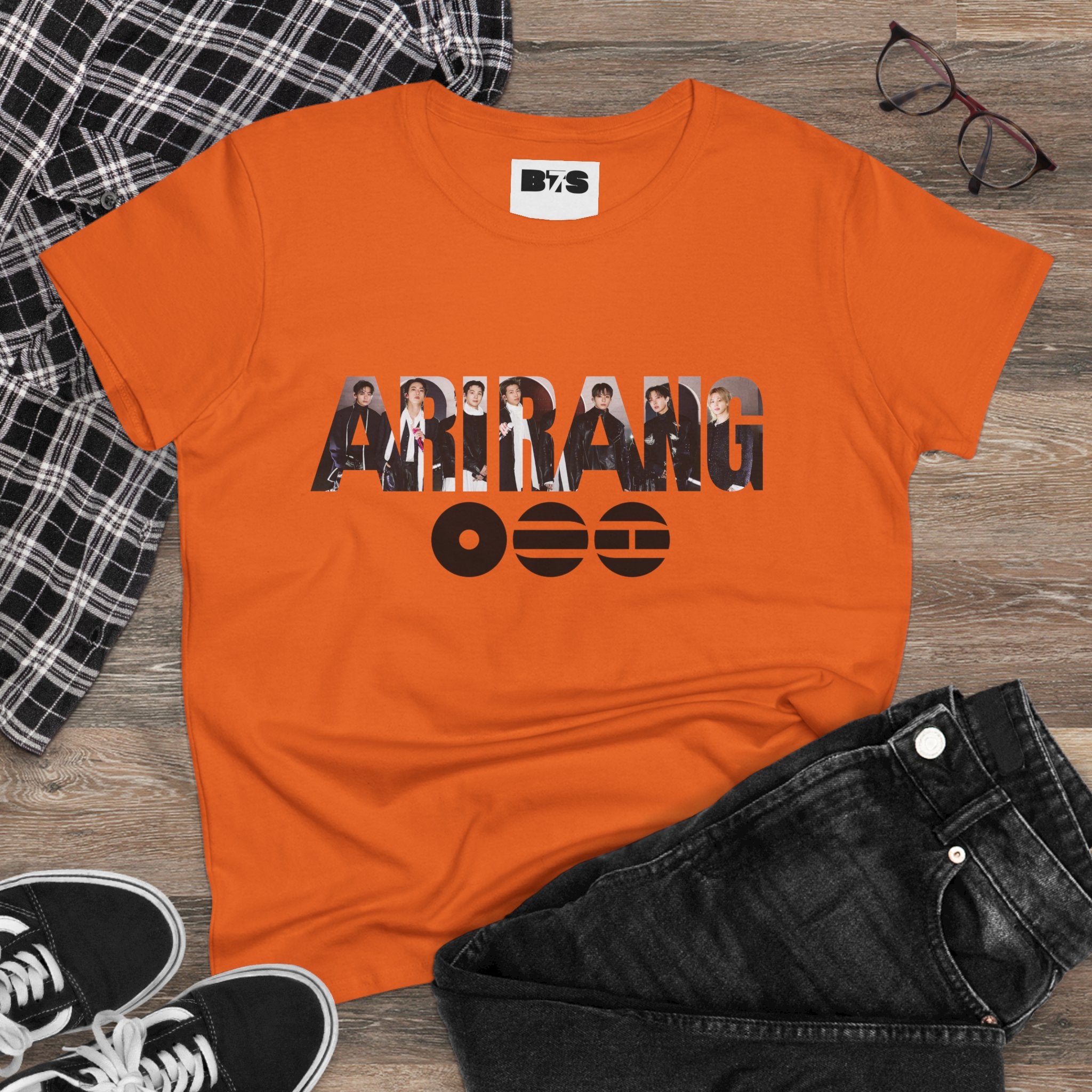 BTS ARIRANG graphic T-shirt featuring BTS logo and member names, casual printed tee by Printify, front view.