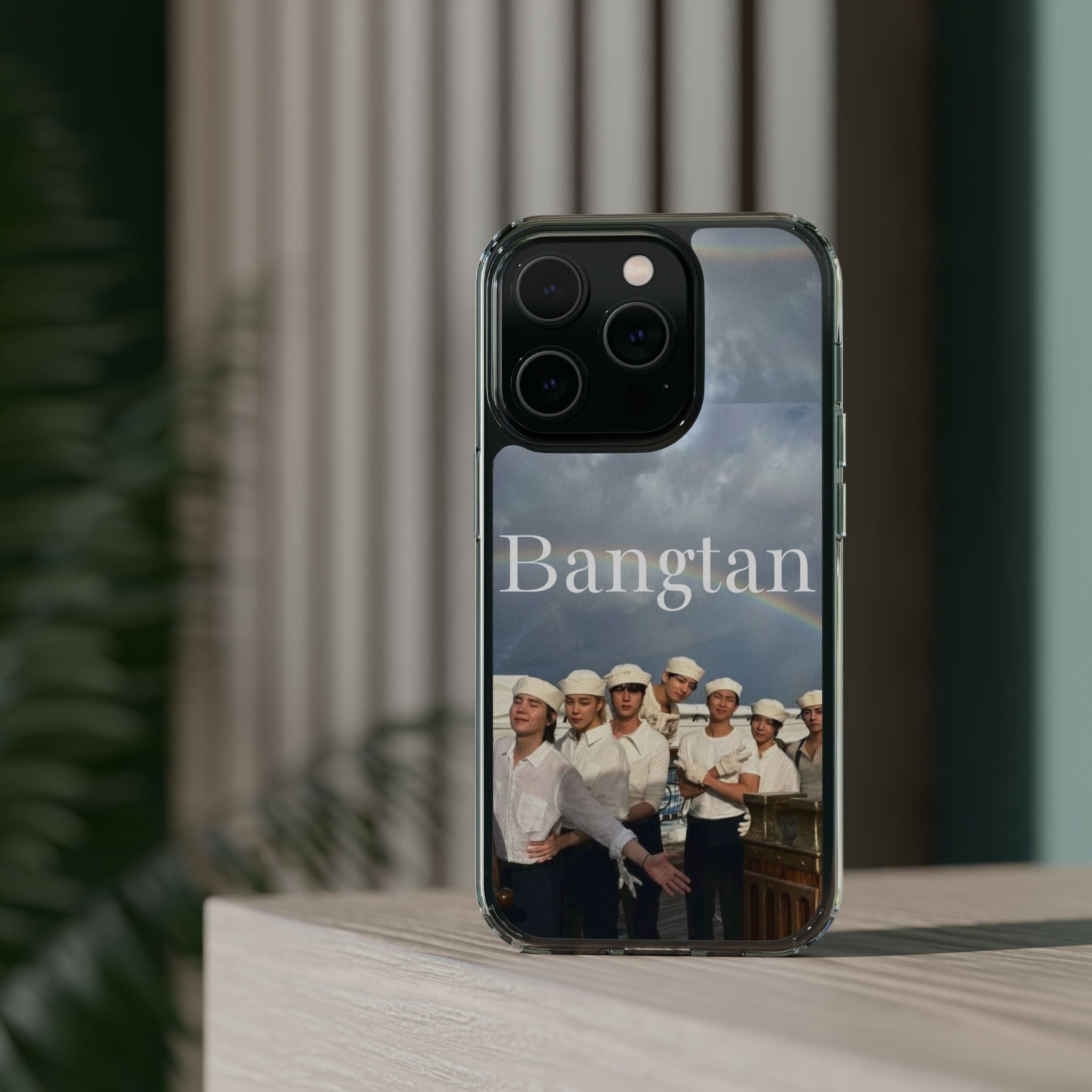Clear impact-resistant phone case featuring cute Bangtan Boys K-pop design for smartphones.