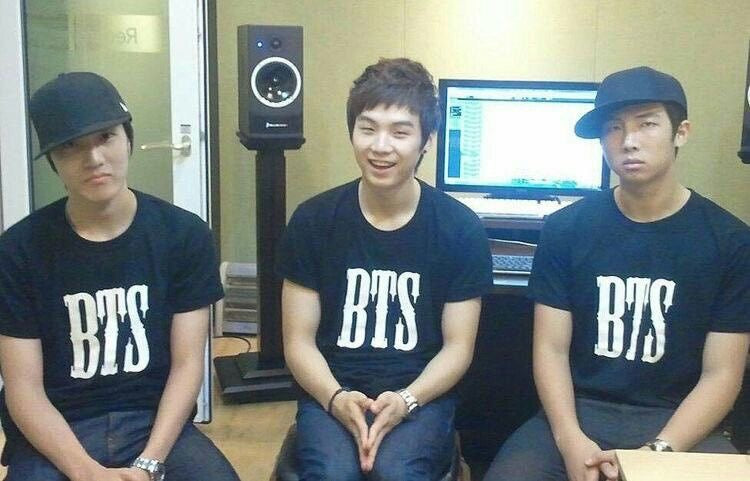 Plain white BTS classic T-shirt with a simple Bangtan Boys outline graphic, featuring a relaxed fit and casual style.