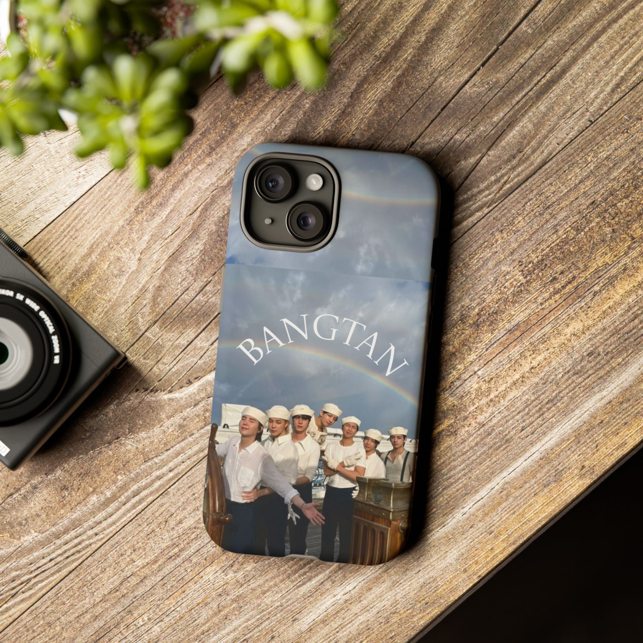 Cute Sailor BTS phone case for iPhone and Samsung, featuring colorful BTS and Arirang Sailor design by Printify.