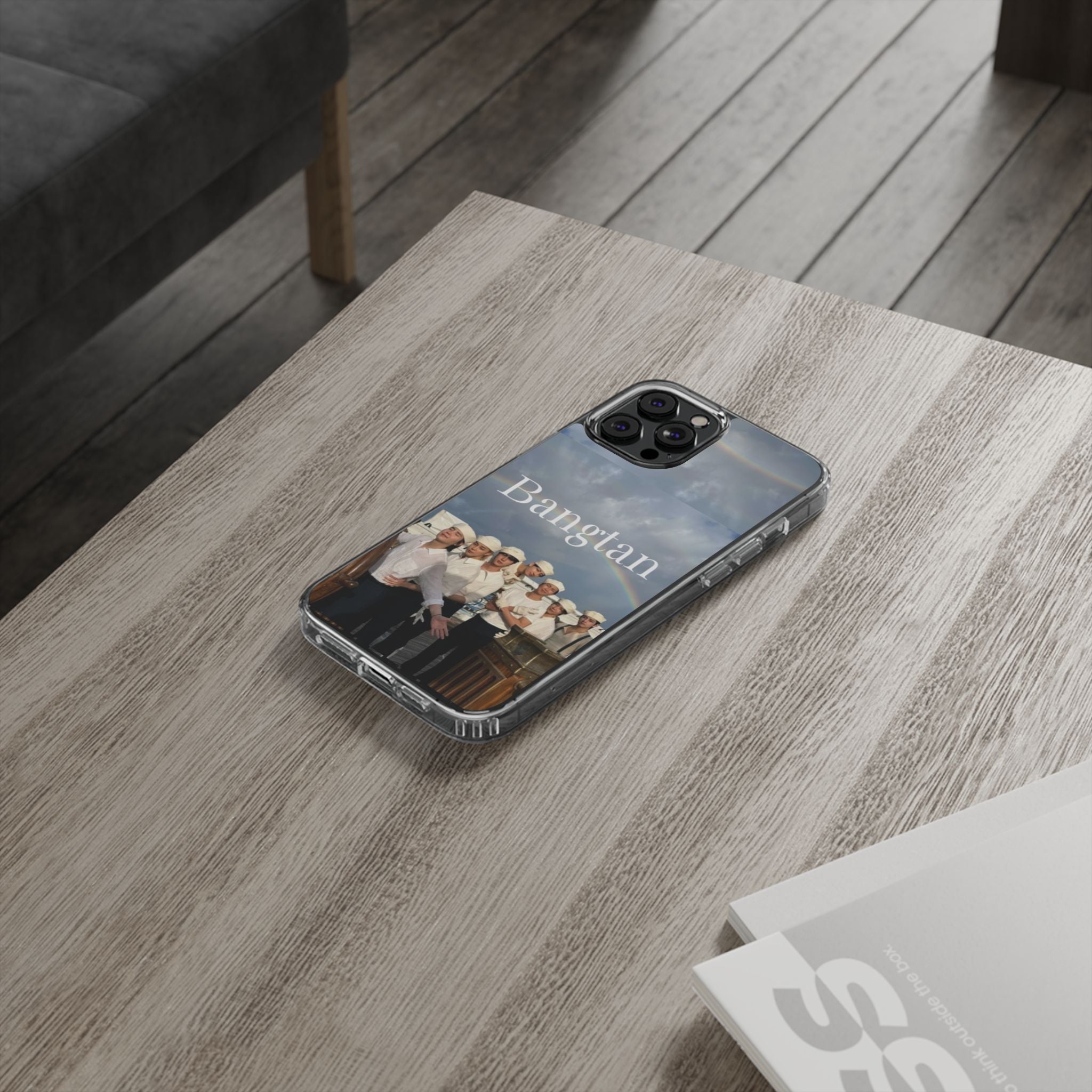 Clear impact-resistant Bangtan phone case featuring cute K-pop design for smartphones, by Printify.
