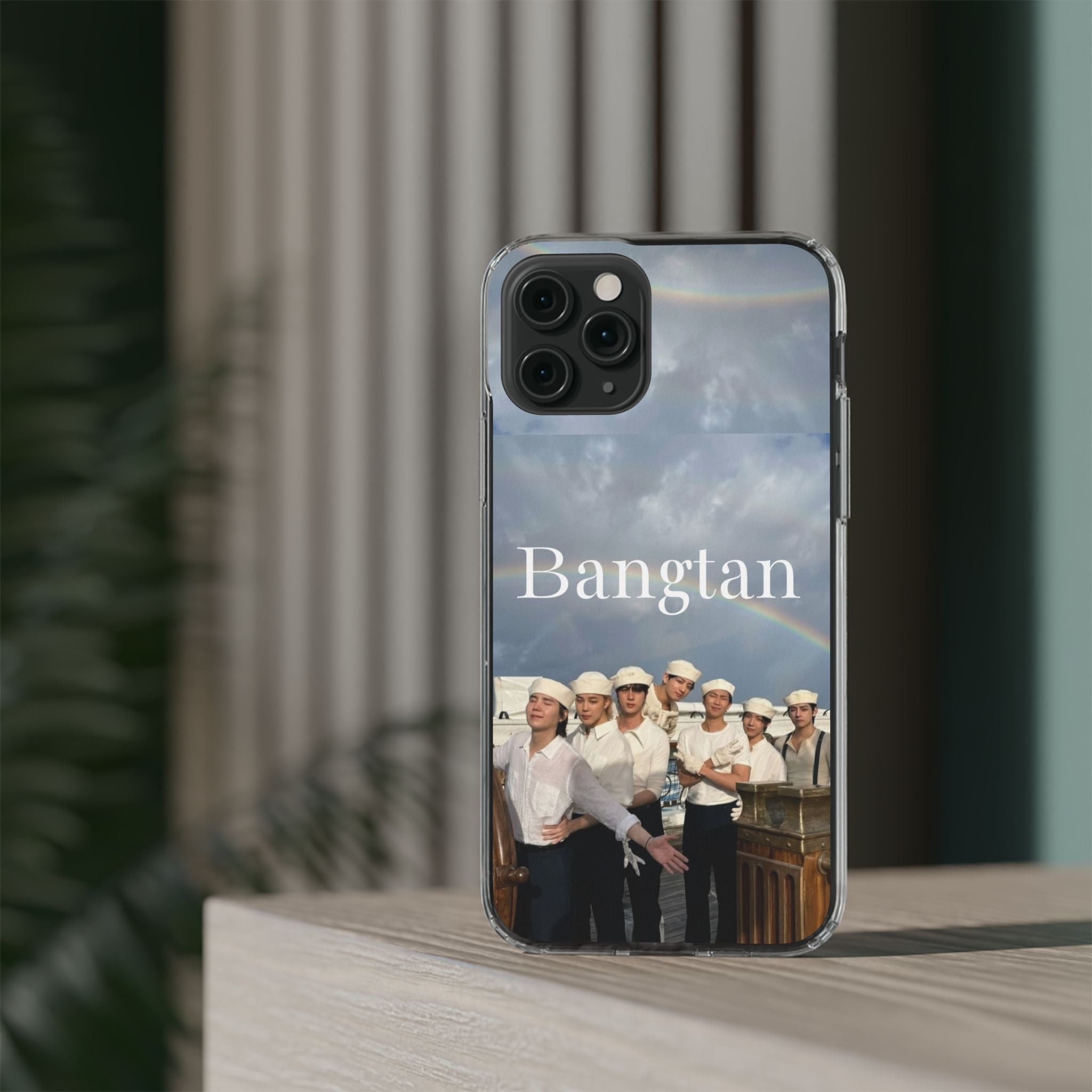 Clear Bangtan Swim Phone Case by Printify featuring cute K-pop design, impact-resistant material for iPhone protection.