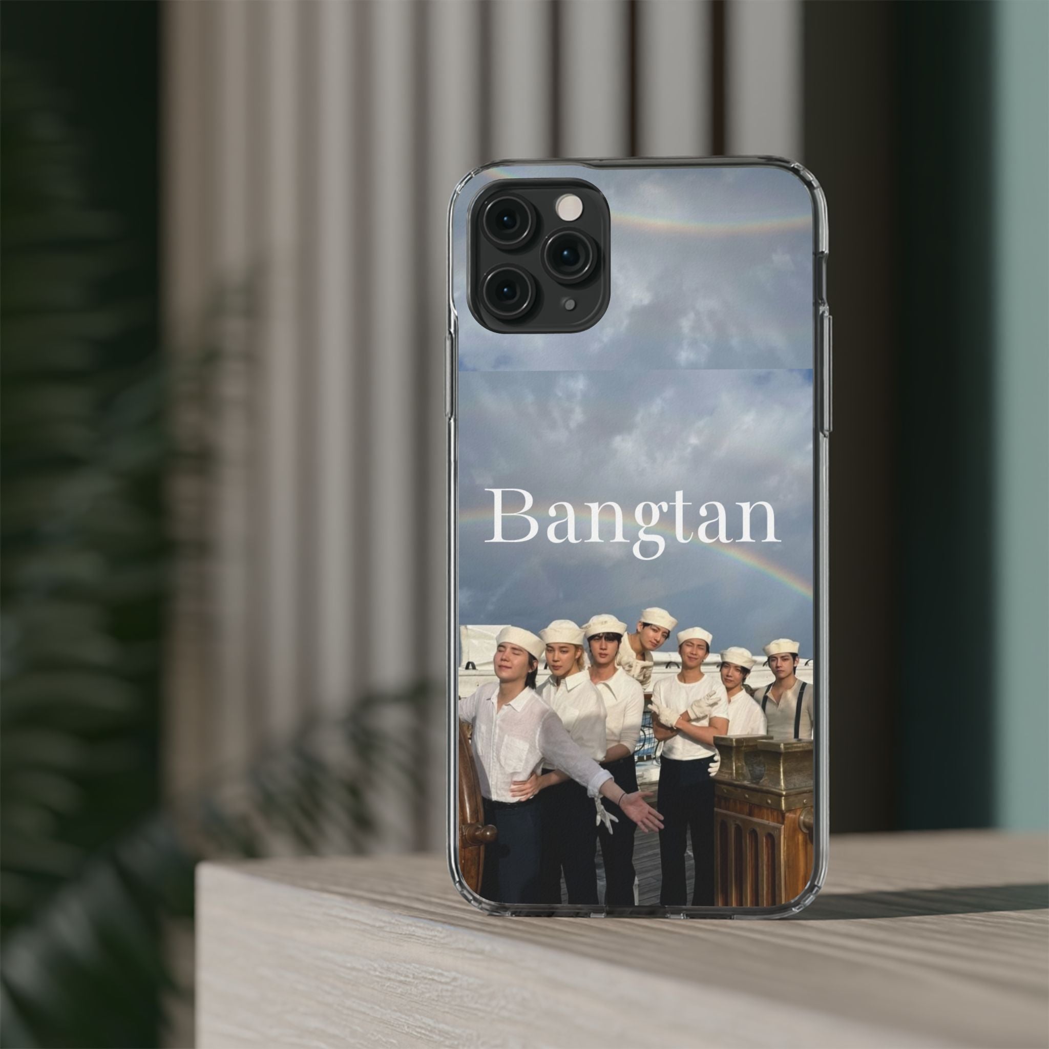 Clear impact-resistant phone case featuring cute Bangtan Boys K-pop design for smartphones.