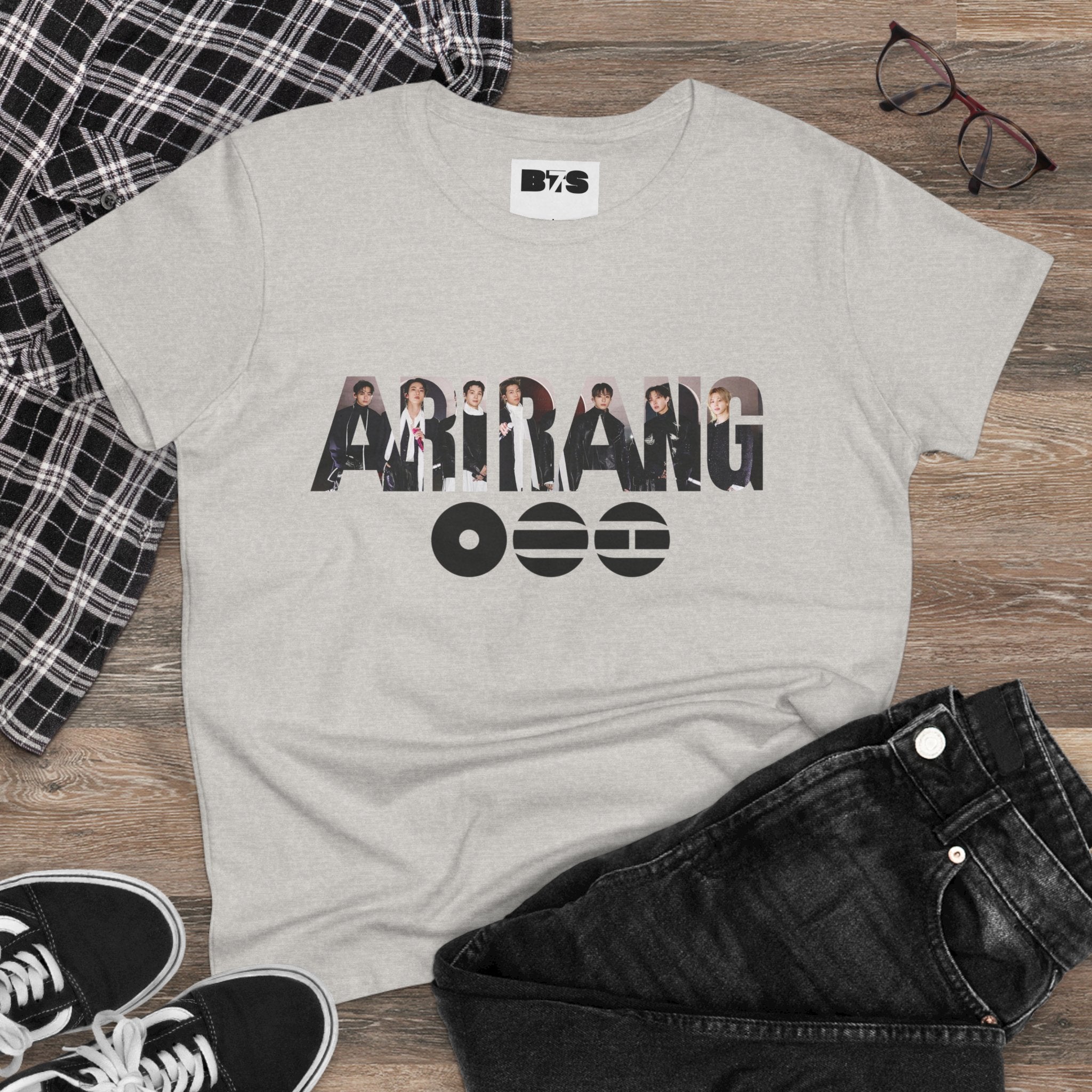 BTS ARIRANG graphic T-shirt featuring band logo and member names in colorful print, casual crew neck style.