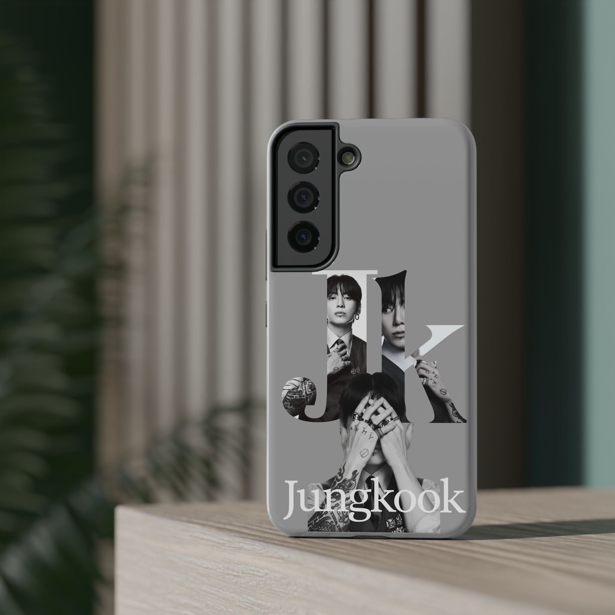 Monochrome Jungkook BTS phone case with impact-resistant design, featuring bold letter and print for Samsung or iPhone models
