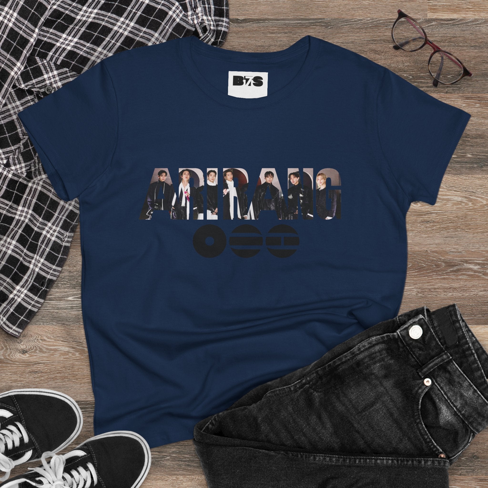 BTS ARIRANG graphic T-shirt featuring band member names and BTS logo in colorful print on a casual tee.